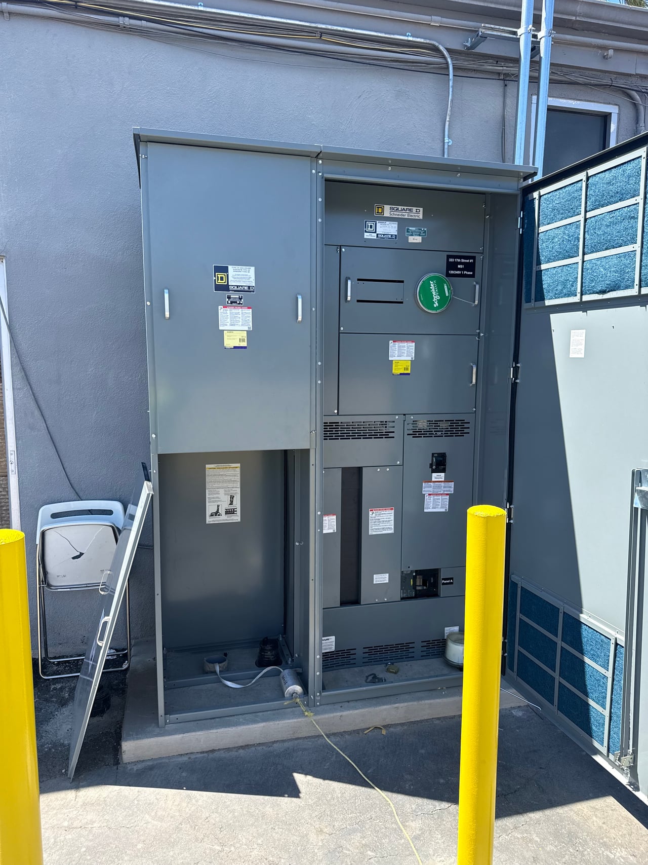 Switchboard with an enclosure door open at 333 17th Street