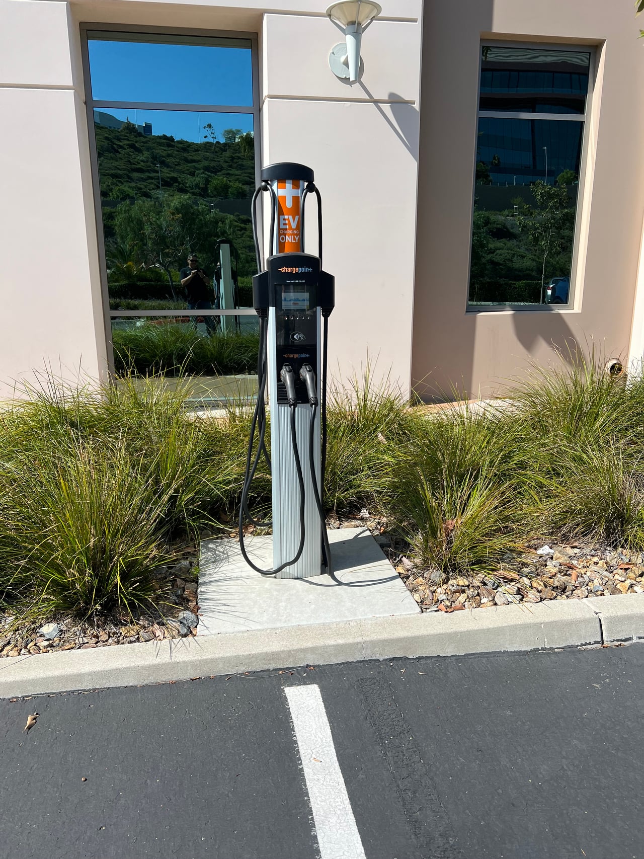 EV charging station beside the building at the CBRE project in San Diego