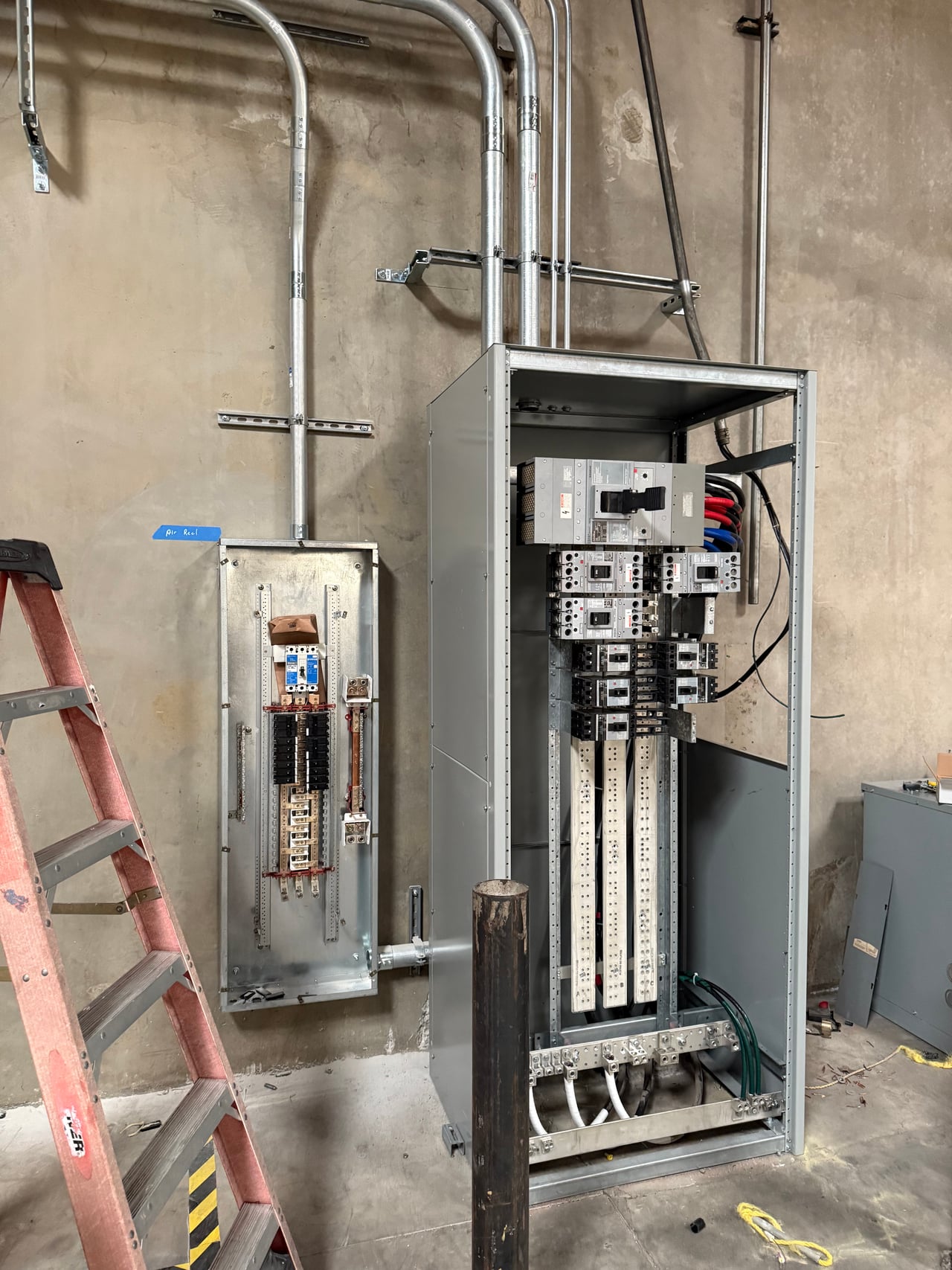 Interior of an electrical panel during installation at Sunset Vans